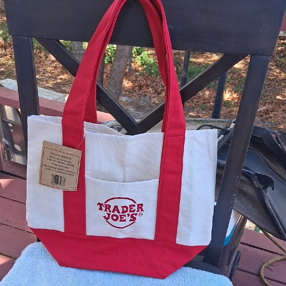 COLLECTABLE TRADER JOES MINI TOTE BAG.BRAND NEW WITH TAG.THESE ARE VERY WANTED!